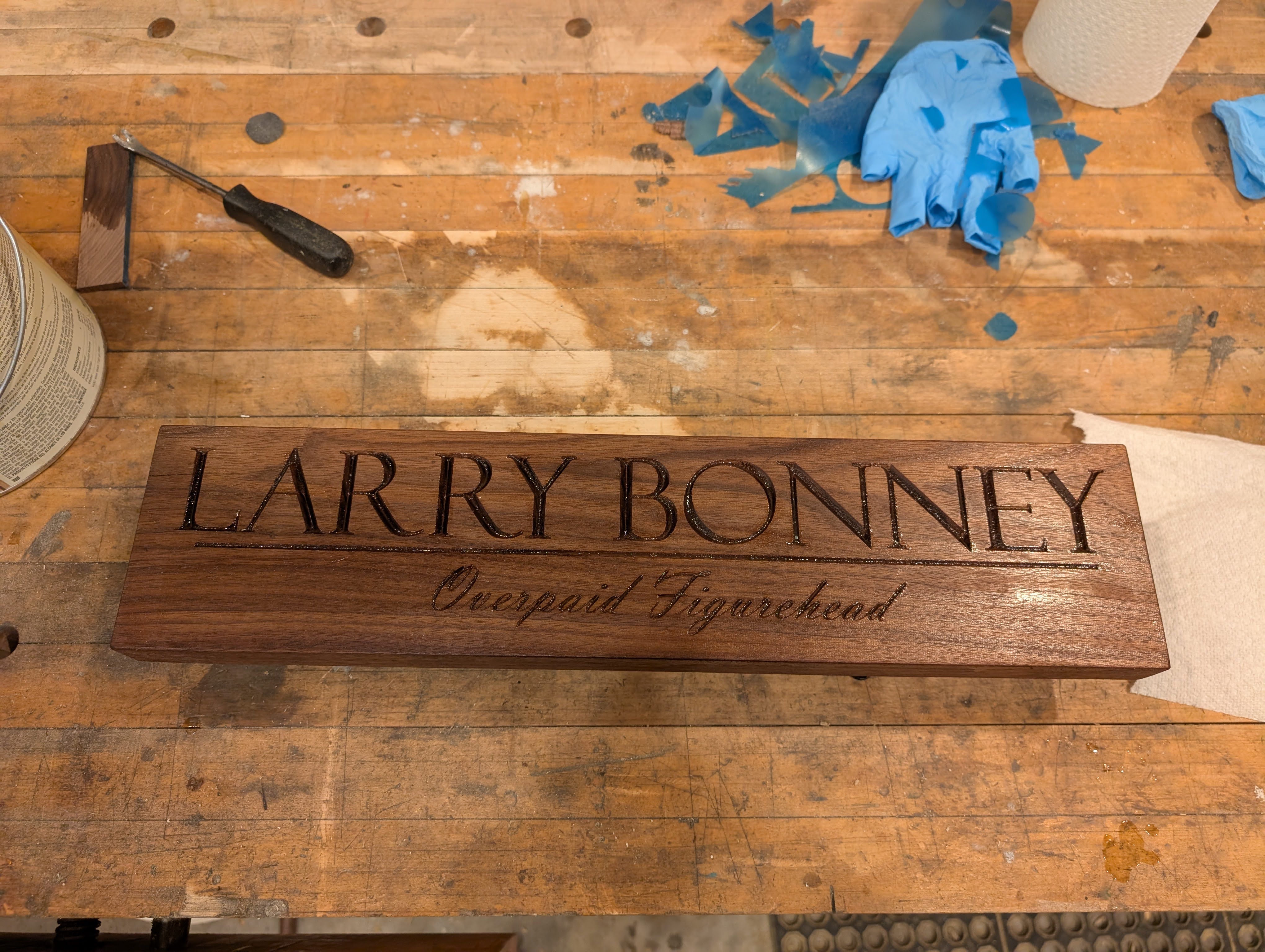 CNC carved wood sign with a custom design