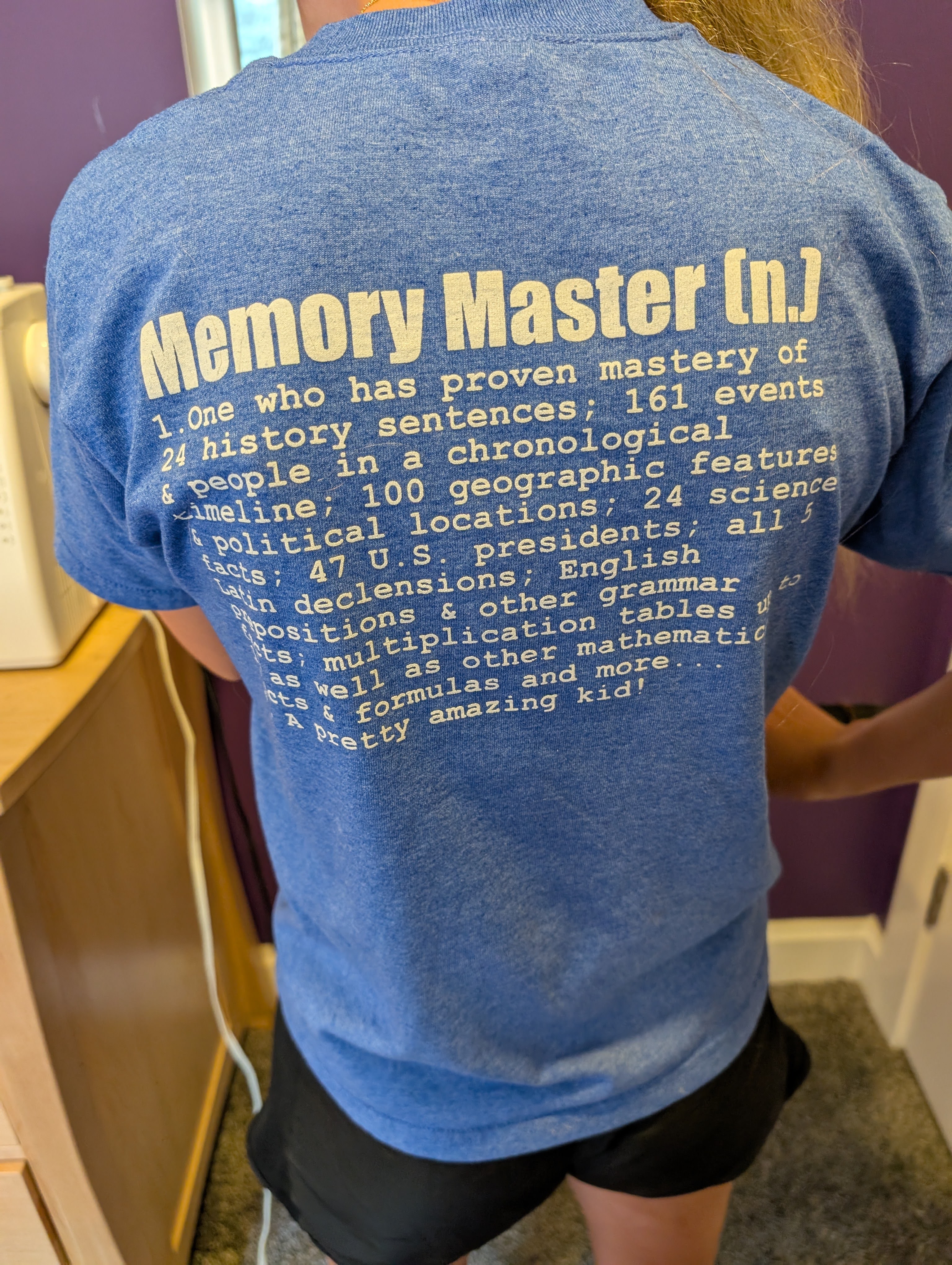 Blue shirt with a white circular screen print