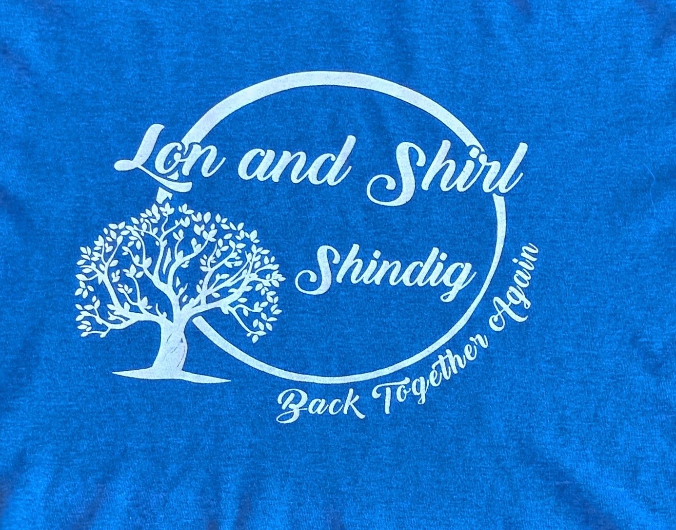 Blue shirt with a custom gold screen print