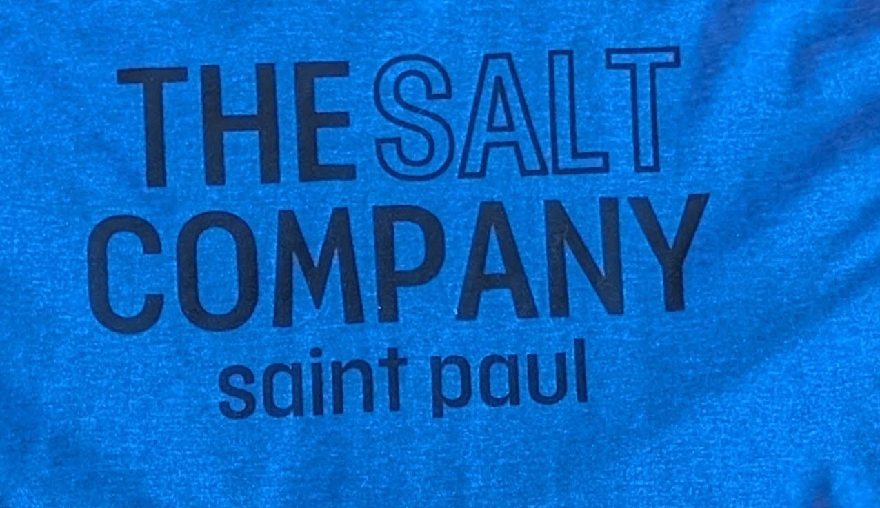 Blue shirt with a gold printed logo