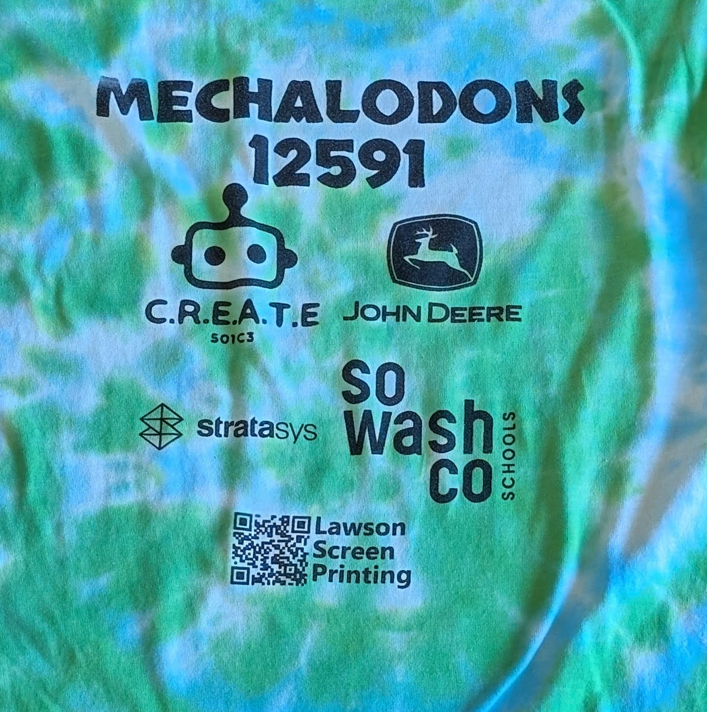 Blue shirt showing a gold screen printed graphic