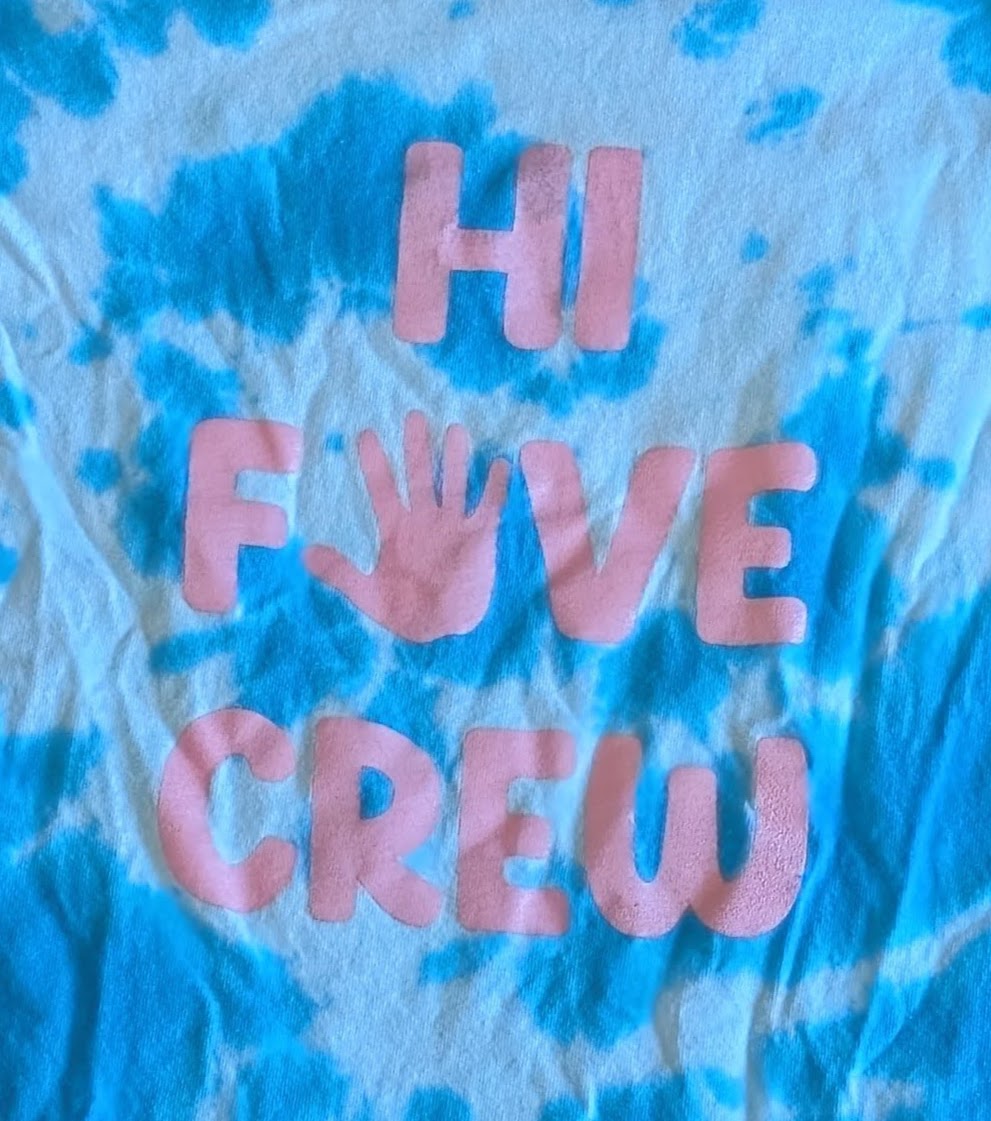 Blue shirt with a gold circular screen print