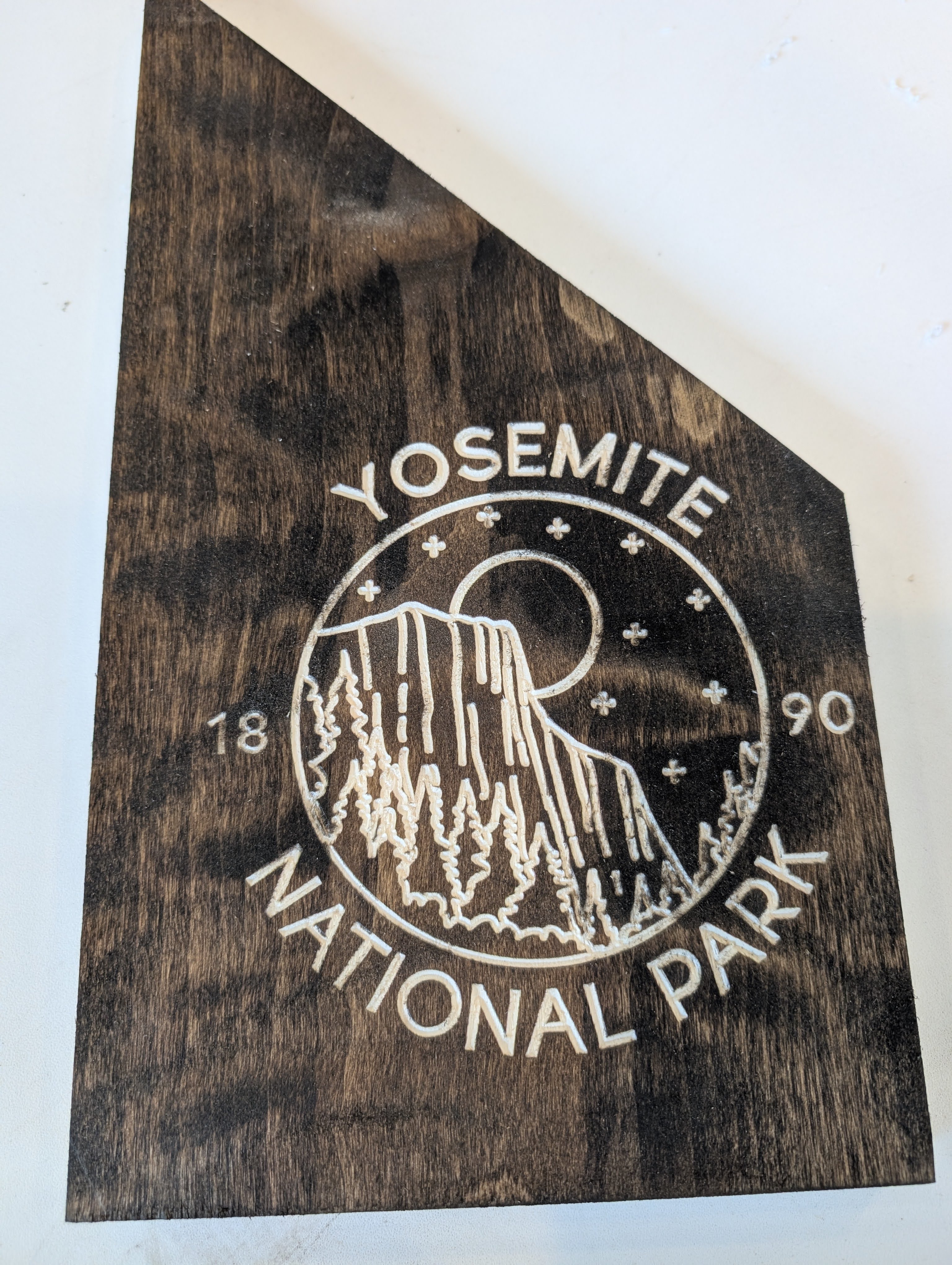 CNC carved wood sign with detailed lettering